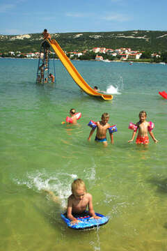 Písečná pláž Planjka, Stará Novalja, ostrov Pag, Chorvatsko