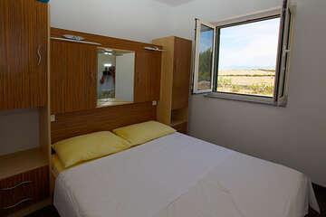 A1 - apartmány Osama, zátoka u Povljany, ostrov Pag, dovolená Chorvatsko