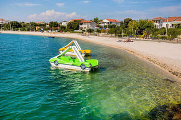 Pláže Vrsi - oblázková pláž Mulo, Zadarská riviéra, Chorvatsko