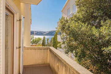 A4 - apartmány Bracera - boční pohled z balkonu na moře (přístup z druhé ložnice), Stará Novalja, ostrov Pag, Chorvatsko