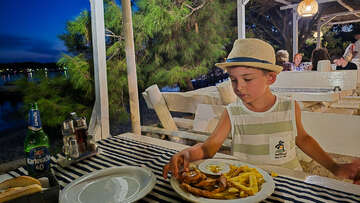 Medulin - večer v restauraci u moře, Istrie, Chorvatsko